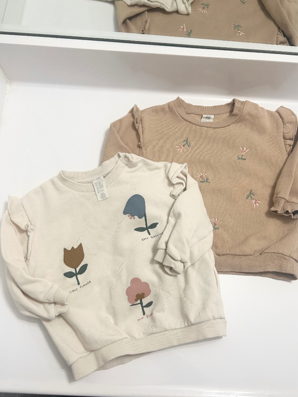 2 girls H&M sweatshirts floral 9-12m